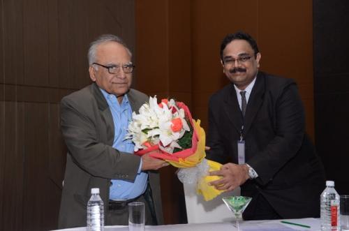 Our MD & CEO Dr J Vijay Venkatraman presenting a bouquet to Prof Dr N K Ganguly, Former Director General of the Indian Council of Medical Research